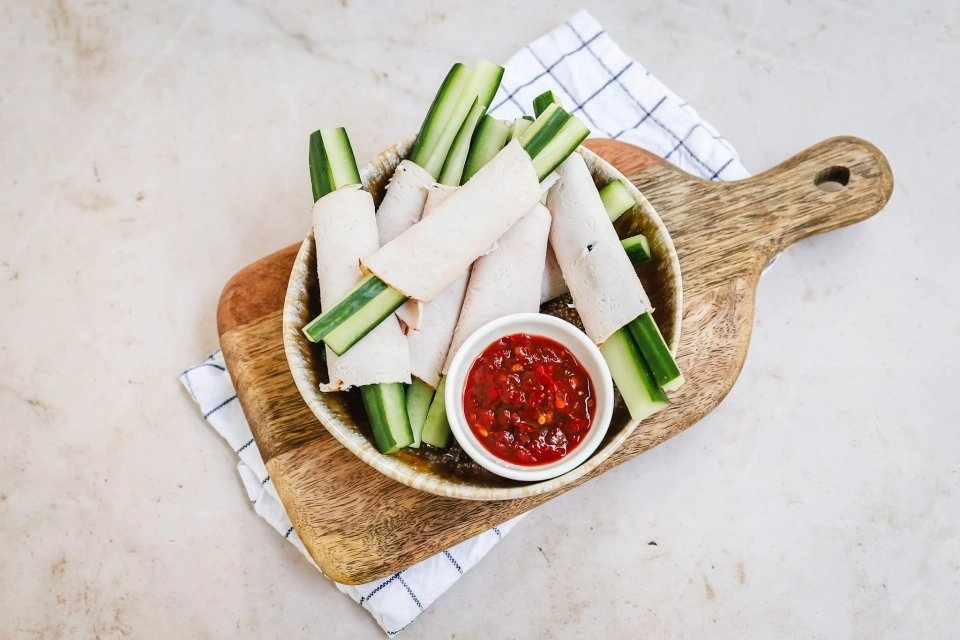 Cucumber slices with turkey breast
