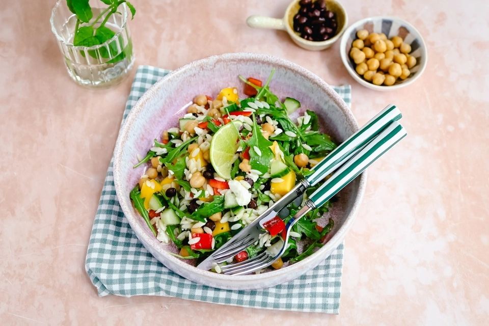 Orzo salad with mango, chickpeas & black beans