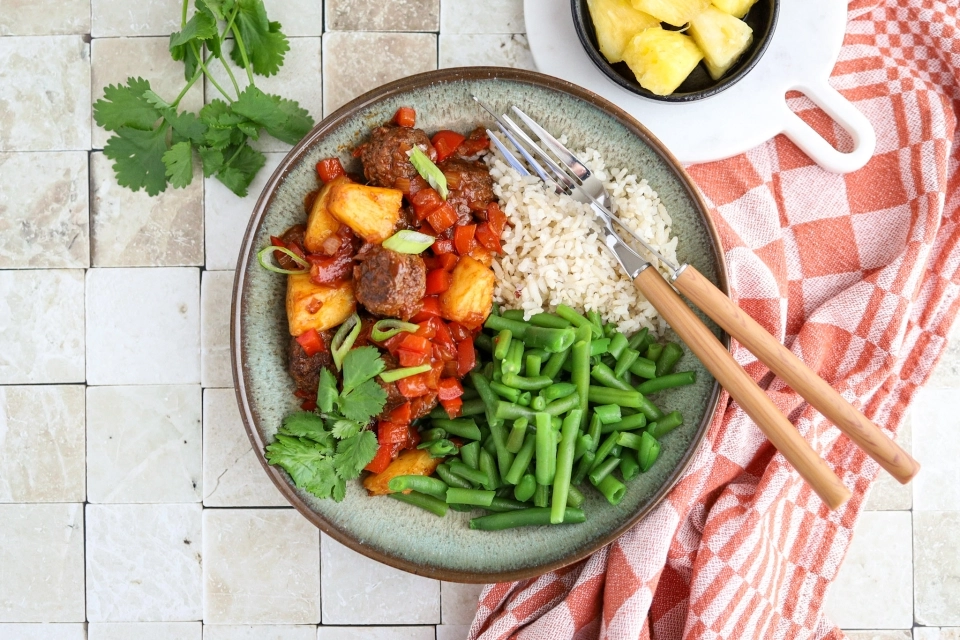 Sweet & sour meatballs with green beans and rice