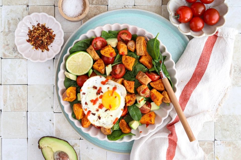Roasted sweet potato & avocado salad with fried egg