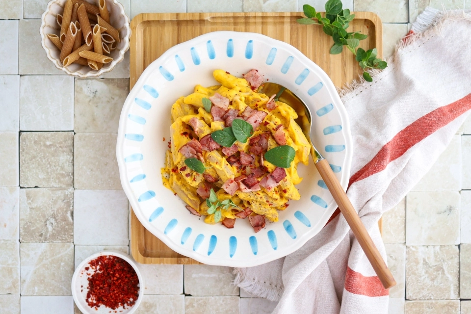 Creamy pumpkin penne with crispy bacon