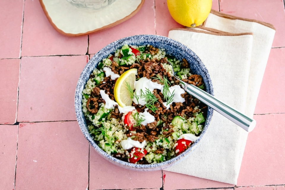 Mediterranean bulgur with spiced beef & lemon garlic yogurt sauce